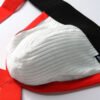 Ribbed white cotton jockstrap with red elastic straps and a black waistband