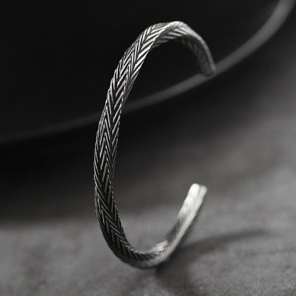 Helix Cuff — Titanium Steel & Geometric Form